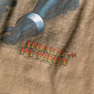 Vintage Shirts - Vintage 2005 Monty Python Flesh Wound T-Shirt Vintage Shirts - Vintage 2005 Monty Python Flesh Wound T-Shirt